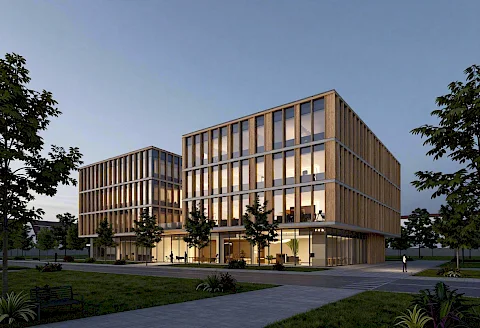Bürocampus Reininghaus – Fassade aus Holz und Glas zur blauen Stunde